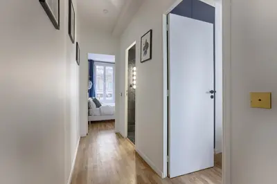 Un ou plusieurs lits dans un hébergement de l'établissement MyKeypers - Amazing Luxury Triplex 3BR 8P - Arc de Triomphe
