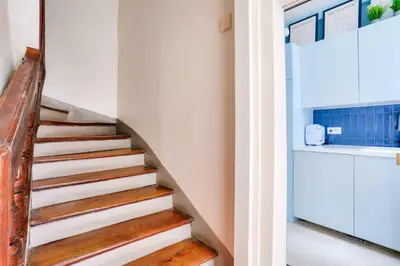 Cuisine ou kitchenette dans l'établissement Renovated studio in the heart of the Marais