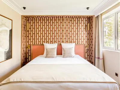 Un ou plusieurs lits dans un hébergement de l'établissement Merveil - Signature Suite - Tour Eiffel - Viala IV
