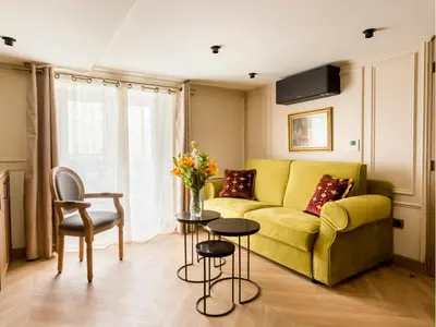 Coin salon dans l'établissement Merveil - Luxury Suite - Marais - Turenne