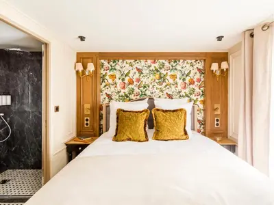 Un ou plusieurs lits dans un hébergement de l'établissement Merveil - Luxury Suite - Marais - Turenne