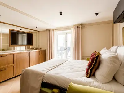 Un ou plusieurs lits dans un hébergement de l'établissement Merveil - Luxury Suite - Marais - Turenne