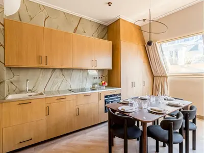 Cuisine ou kitchenette dans l'établissement Merveil - Signature Suite - Tour Eiffel - Desaix I