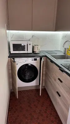 Cuisine ou kitchenette dans l'établissement Large studio apartment Invalides Montparnasse