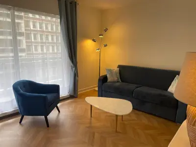 Coin salon dans l'établissement Large studio apartment Invalides Montparnasse