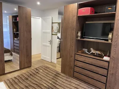 Télévision ou salle de divertissement dans l'établissement Cosy, chic, touristique