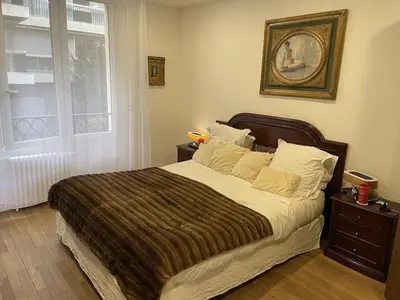 Un ou plusieurs lits dans un hébergement de l'établissement Cosy, chic, touristique