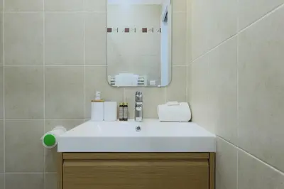 Salle de bains dans l'établissement Flat 1BDR 2P Roland Garros Parc des