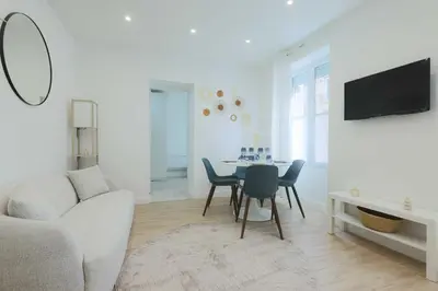Télévision ou salle de divertissement dans l'établissement Flat 1BDR 2P Roland Garros Parc des