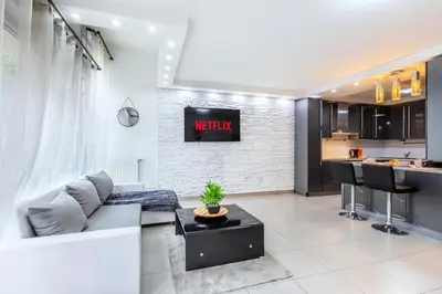 Cuisine ou kitchenette dans l'établissement Triplex cosy à 20min des Champs Elysées