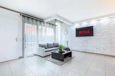 Coin salon dans l'établissement Triplex cosy à 20min des Champs Elysées