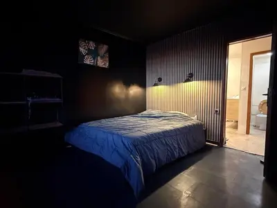 Un ou plusieurs lits dans un hébergement de l'établissement Netflix & sky jacuzzi