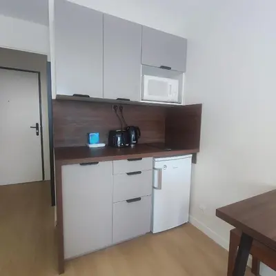 Cuisine ou kitchenette dans l'établissement Charming Studio near Paris - La Défense