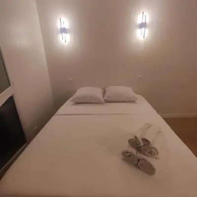 Un ou plusieurs lits dans un hébergement de l'établissement Charming Studio near Paris - La Défense