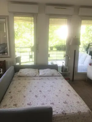 Un ou plusieurs lits dans un hébergement de l'établissement Apt terrace Paris Sud 300m des transport
