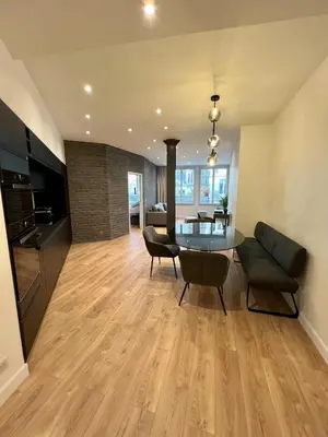 Coin salon dans l'établissement Spacious newly renovated loft with AC