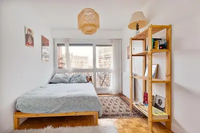 Un ou plusieurs lits dans un hébergement de l'établissement Atypical apartment in Butte Montmartre
