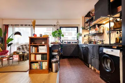 Cuisine ou kitchenette dans l'établissement Atypical apartment in Butte Montmartre