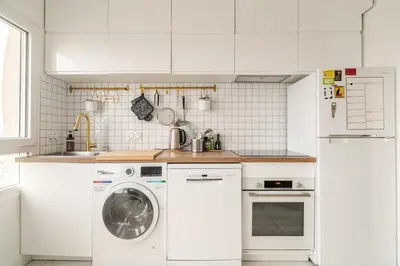 Cuisine ou kitchenette dans l'établissement Nice Apartment with amazing view of Paris plus Parking
