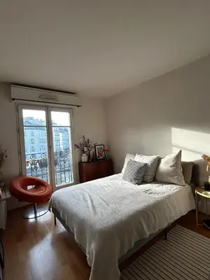 Un ou plusieurs lits dans un hébergement de l'établissement Spacious and bright apartment - Canal St-Martin