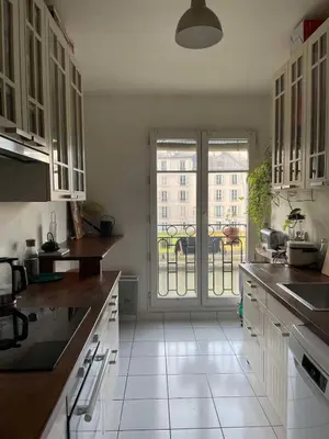 Cuisine ou kitchenette dans l'établissement Spacious and bright apartment - Canal St-Martin