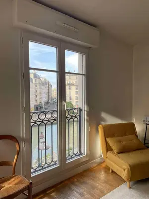 Coin salon dans l'établissement Spacious and bright apartment - Canal St-Martin