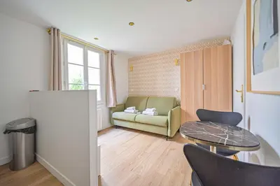 Coin salon dans l'établissement Cosy Nest - 2P - The 16th arrondissement