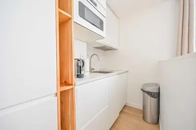 Cuisine ou kitchenette dans l'établissement Cosy Nest - 2P - The 16th arrondissement