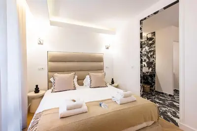 Un ou plusieurs lits dans un hébergement de l'établissement Chic house - 3BR 8P - Ternes Arc de Triomphe