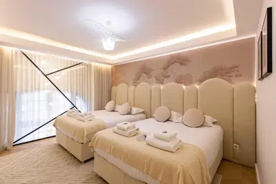 Un ou plusieurs lits dans un hébergement de l'établissement Chic house - 3BR 8P - Ternes Arc de Triomphe