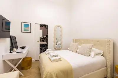Un ou plusieurs lits dans un hébergement de l'établissement Chic house - 3BR 8P - Ternes Arc de Triomphe
