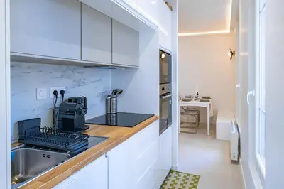 Cuisine ou kitchenette dans l'établissement Haussmann Apartment - Champs-Élysées