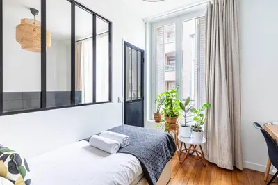 Un ou plusieurs lits dans un hébergement de l'établissement GuestReady - Peaceful escape in Père-Lachaise