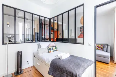 Un ou plusieurs lits dans un hébergement de l'établissement GuestReady - Peaceful escape in Père-Lachaise