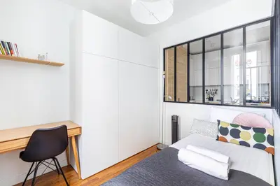 Un ou plusieurs lits dans un hébergement de l'établissement GuestReady - Peaceful escape in Père-Lachaise