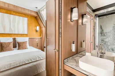 Un ou plusieurs lits dans un hébergement de l'établissement Merveil - Signature Suite - Tour Eiffel -Desaix II