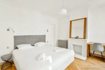 Un ou plusieurs lits dans un hébergement de l'établissement GuestReady - Modern comfort in Les Batignolles
