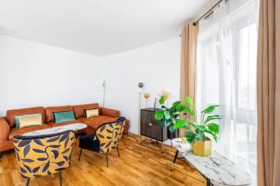 Coin salon dans l'établissement GuestReady - Charming Family Duplex with a terrace