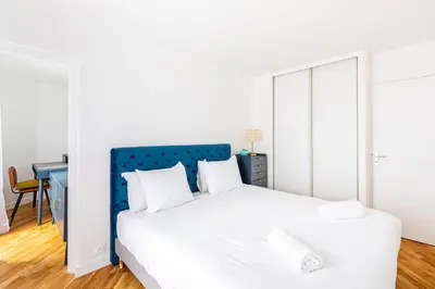 Un ou plusieurs lits dans un hébergement de l'établissement GuestReady - Charming Family Duplex with a terrace