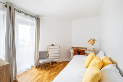 Un ou plusieurs lits dans un hébergement de l'établissement GuestReady - Charming Family Duplex with a terrace