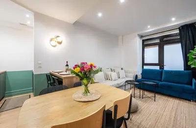 Coin salon dans l'établissement Le Marais l 5BR & AC - Duplex Home in Paris