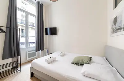 Un ou plusieurs lits dans un hébergement de l'établissement Le Marais l 5BR & AC - Duplex Home in Paris