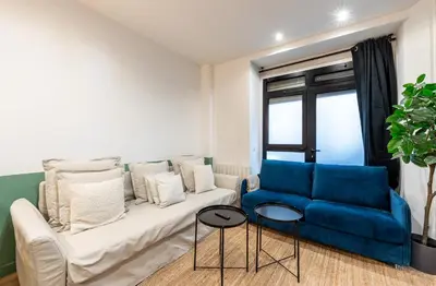 Coin salon dans l'établissement Le Marais l 5BR & AC - Duplex Home in Paris