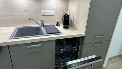 Cuisine ou kitchenette dans l'établissement Appartement cosy au cœur du 15e - 1br-3p