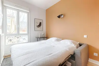 Un ou plusieurs lits dans un hébergement de l'établissement Mykeypers - Studio Cozy 2P - Malakoff 11