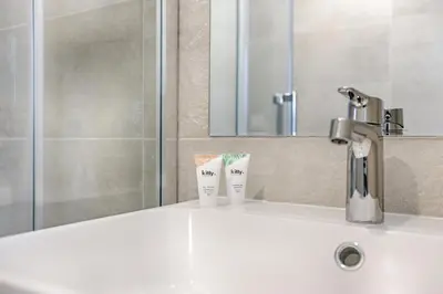 Salle de bains dans l'établissement Mykeypers - Studio Deluxe 2P - Malakoff 16