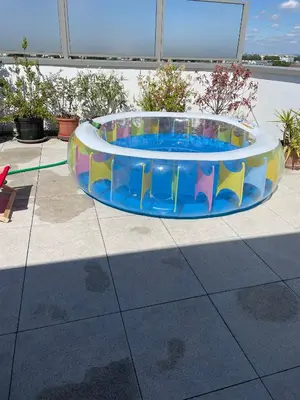 Piscine de l'établissement Chambre dans un grand appartement avec terrasse ou située à proximité