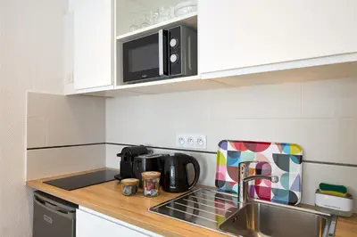 Cuisine ou kitchenette dans l'établissement Hotel Résidence Paris Asnières