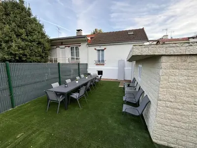 Jardin de l'établissement VR House 14 bedrooms 3 min metro 23 beds PARC EXPO