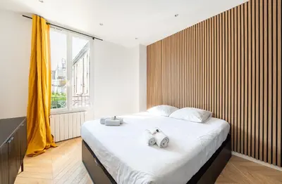 Un ou plusieurs lits dans un hébergement de l'établissement Mobility lease l Neuilly l Equipped & Paris 10mins away